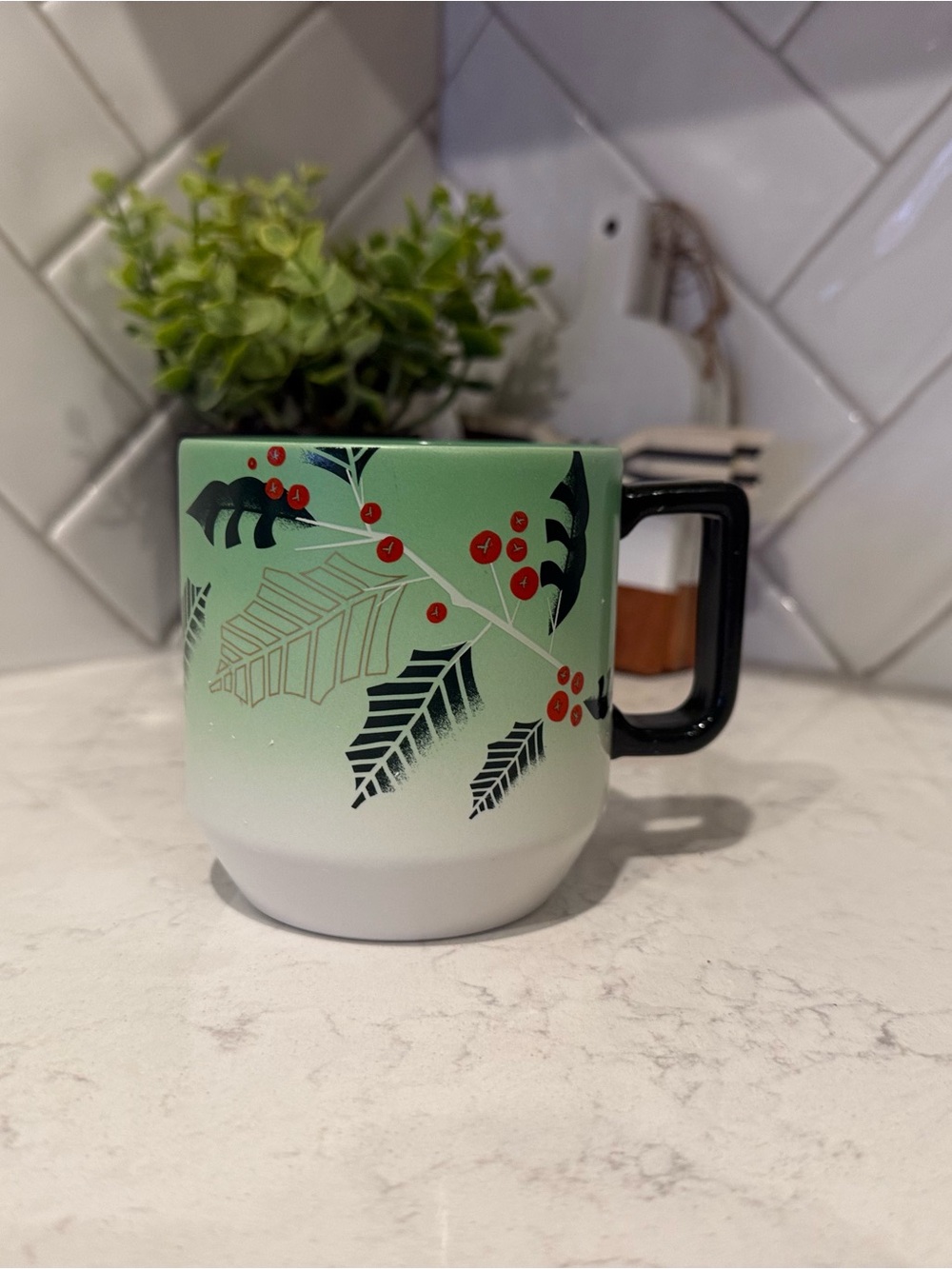 Green Botanical Ceramic Mug with Red Berry Accent